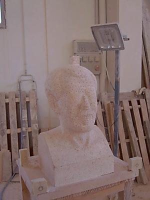 Busto de Isaac de Frutos "El carterillo" en proceso de ejecución. Sacado de puntos. Piedra Rosa Sepúlveda.   